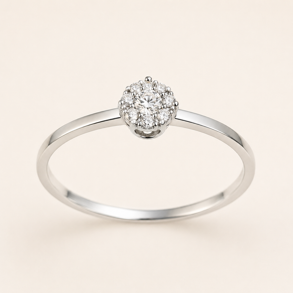 Anello in Oro 18 kt con Diamante Centrale e Diamanti Laterali 0,14 ct